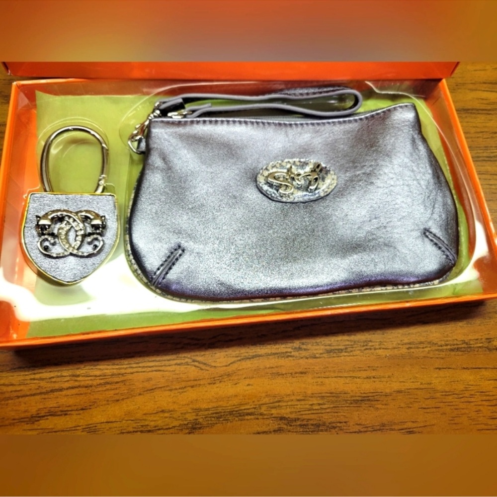 NIB Sharif Silver Clutch with Reflective Dome Design and Heart Charm